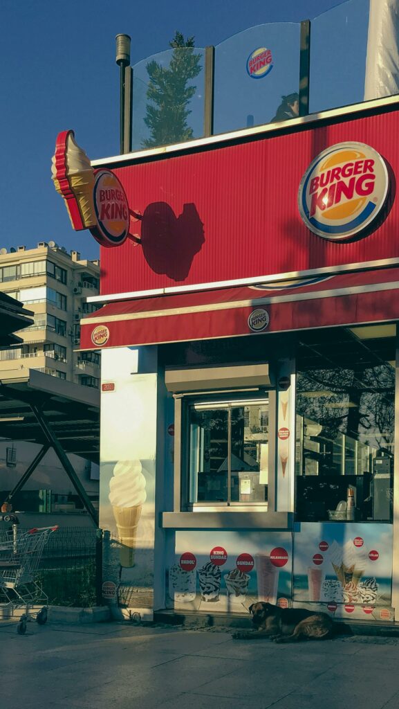 Burger King restaurant exterior with signage and sunny outdoor view.
